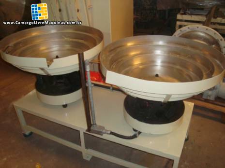 Posicionador para alimentador vibratório de tempo duplo Posicionador para alimentador vibratório de tempo duplo